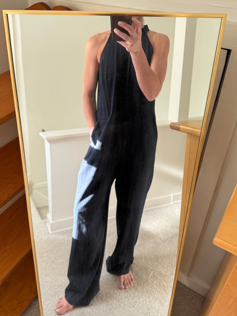 Ganni Black Pinstripe Jumpsuit with pockets.